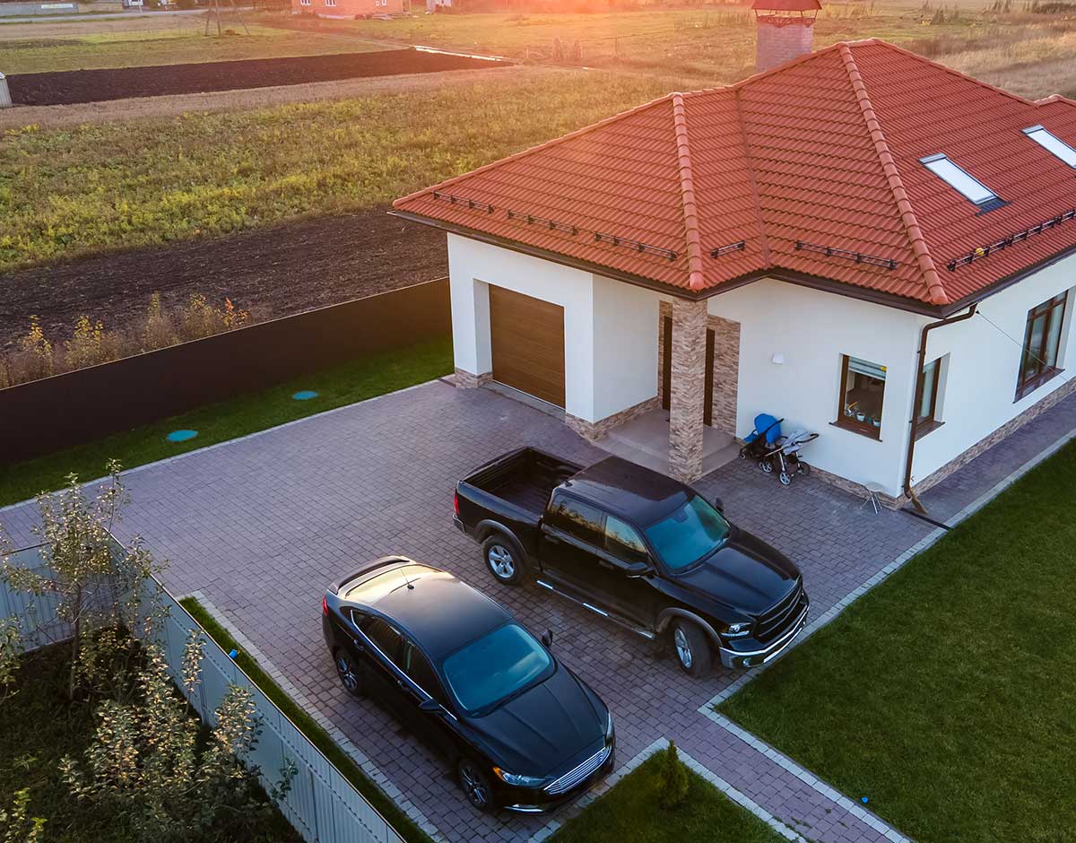 aerial-view-private-suburban-house-with-parked-cars-back-yard